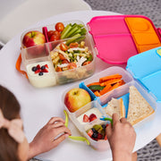 child with lunchbox - strawberry shake - b.box for kids